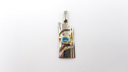 BLUE TOPAZ TWO TONE ( BLACK RHODIUM AND GOLD PLATED ) STERLING SILVER PENDANT