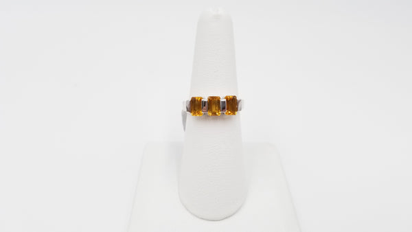 CITRINES ( EMERALD CUT ) 3 STONES 14 KT WHITE GOLD BAND