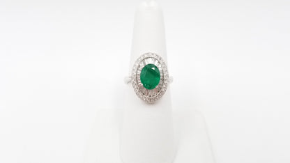 EMERALD ( OVAL ) WITH DIAMONDS IN 18 KT WHITE GOLD RING