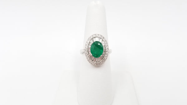 EMERALD ( OVAL ) WITH DIAMONDS IN 18 KT WHITE GOLD RING