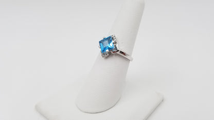 BLUE TOPAZ ( SQUARE ) WITH DIAMONDS 14 KT WHITE GOLD RING