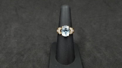 AQUAMARINE ( OVAL ) 8X10 MM  WITH DIAMONDS 14 KT YELLOW GOLD RING