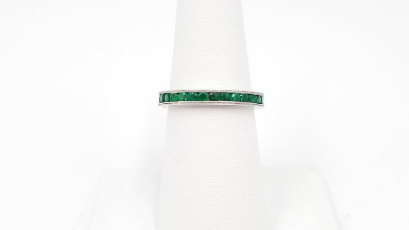 EMERALDS CHANNEL SET 18 KT WHITE GOLD ETERNITY BAND