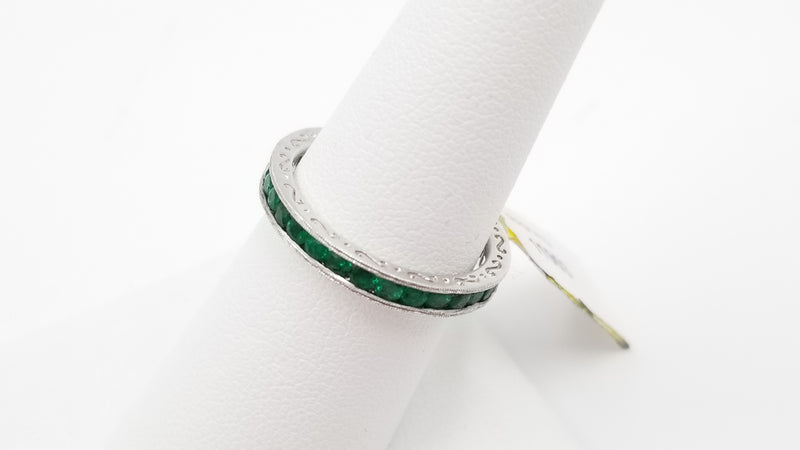 EMERALDS CHANNEL SET 18 KT WHITE GOLD ETERNITY BAND