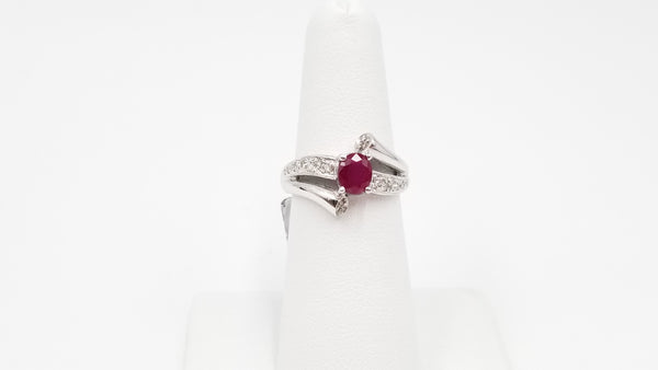 RUBY WITH DIAMONDS 14 KT WHITE GOLD RING