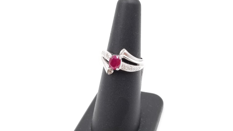 RUBY WITH DIAMONDS 14 KT WHITE GOLD RING