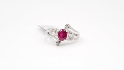 RUBY WITH DIAMONDS 14 KT WHITE GOLD RING