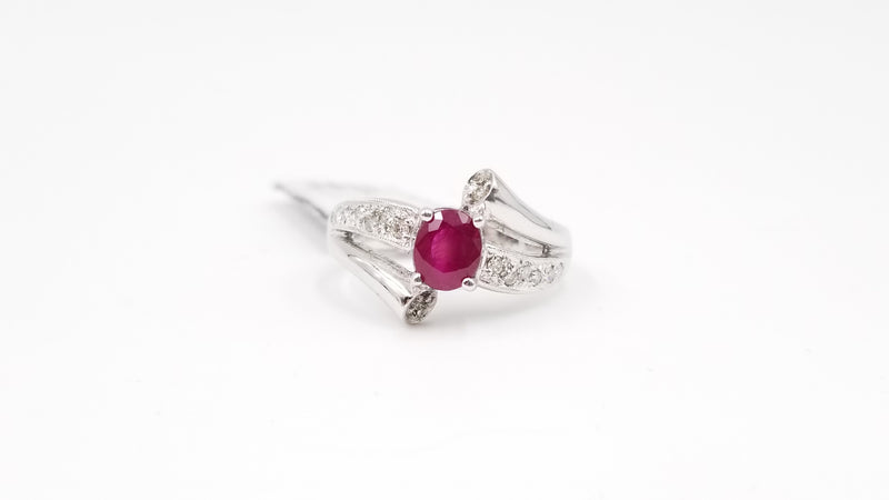 RUBY WITH DIAMONDS 14 KT WHITE GOLD RING