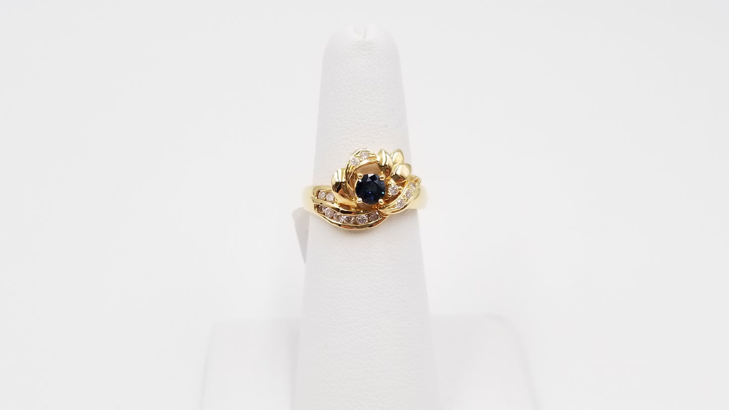 SAPPHIRE WITH DIAMONDS 18 KT YELLOW GOLD RING