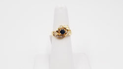 SAPPHIRE WITH DIAMONDS 18 KT YELLOW GOLD RING