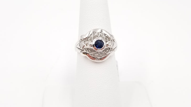 SAPPHIRE WITH DIAMONDS 18 KT WHITE GOLD RING