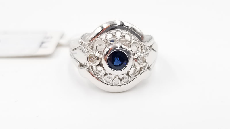 SAPPHIRE WITH DIAMONDS 18 KT WHITE GOLD RING