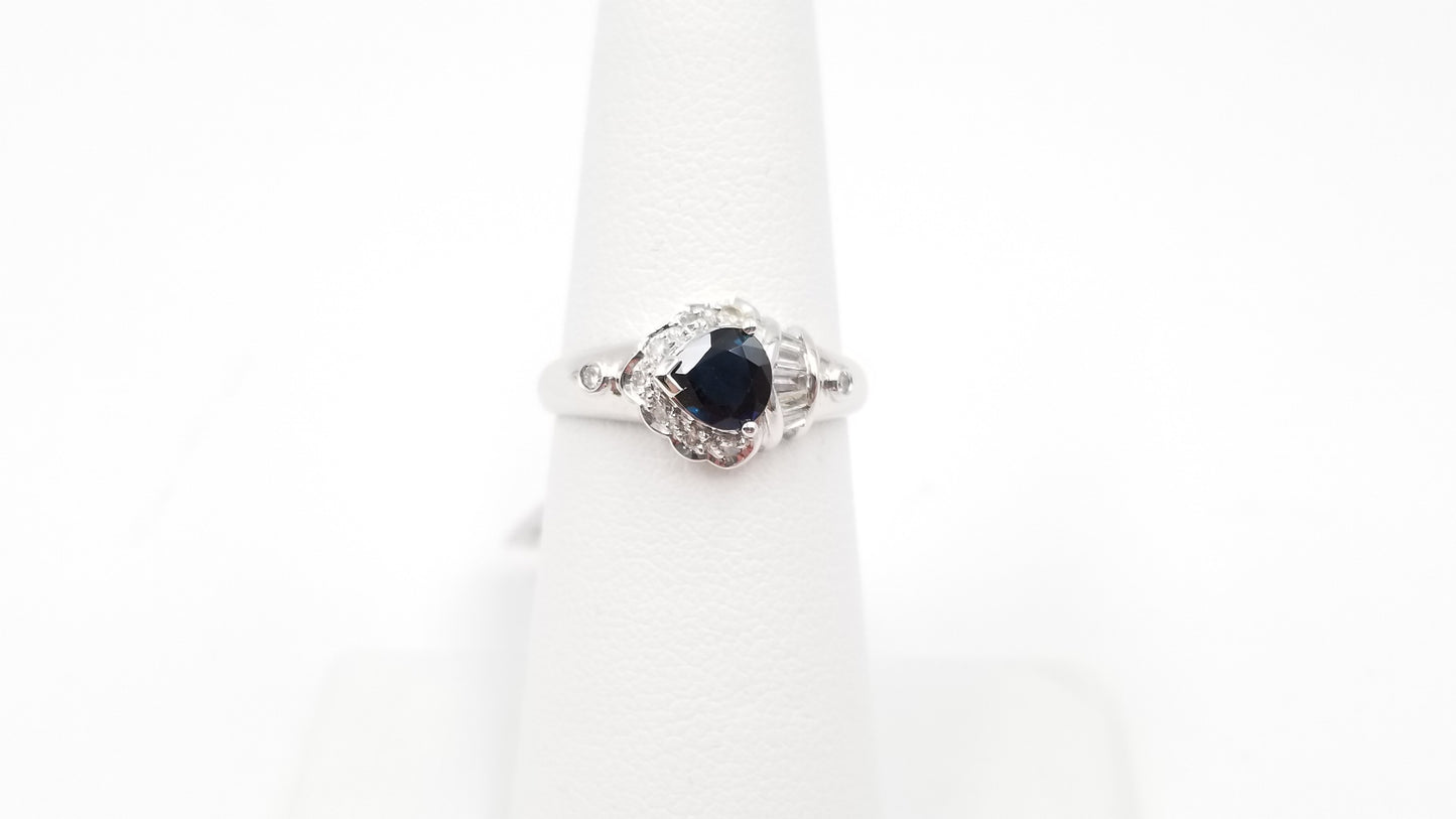 SAPPHIRE ( PEAR SHAPE ) WITH BAGUETTE DIAMONDS 18 KT WHITE GOLD RING