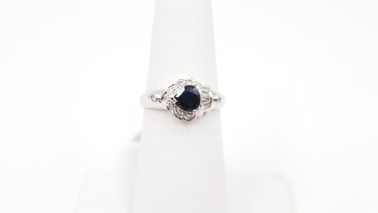 SAPPHIRE ( PEAR SHAPE ) WITH BAGUETTE DIAMONDS 18 KT WHITE GOLD RING