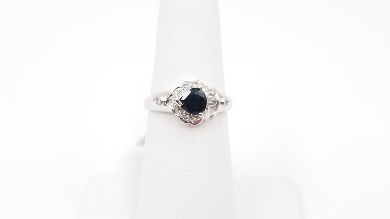 SAPPHIRE ( PEAR SHAPE ) WITH BAGUETTE DIAMONDS 18 KT WHITE GOLD RING