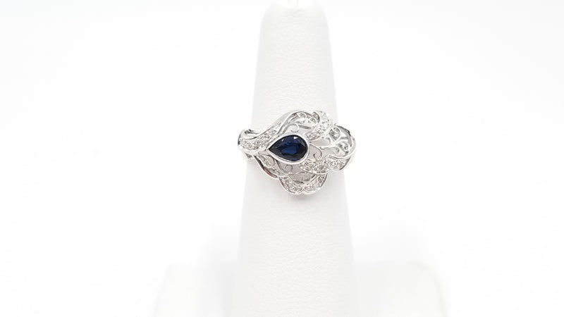 SAPPHIRE ( PEAR SHAPE ) BEZEL SET WITH DIAMONDS 18 KT WHITE GOLD RING