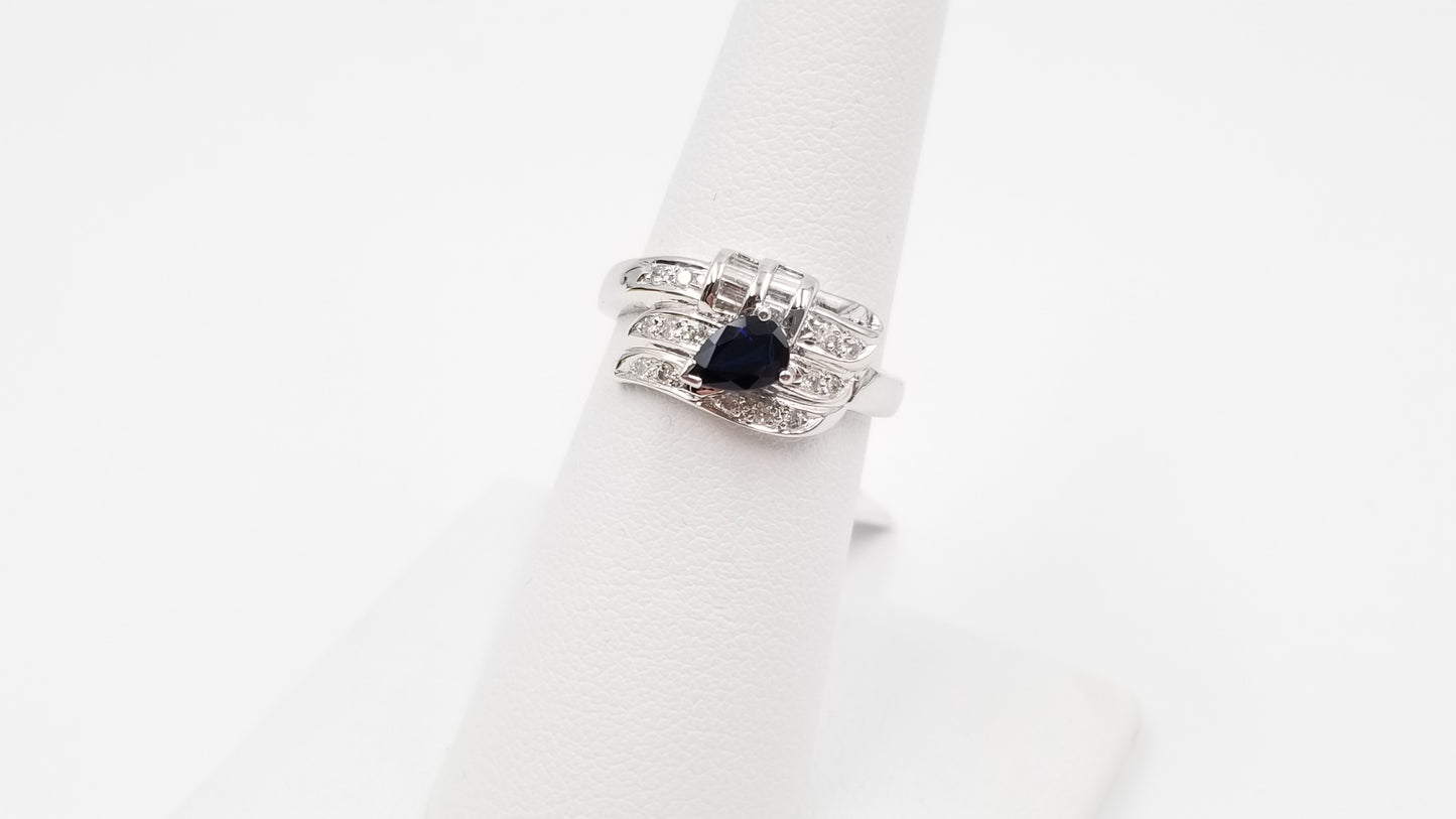 SAPPHIRE ( PEAR SHAPE ) WITH  BAGUETTE DIAMONDS 18 KT WHITE GOLD RING