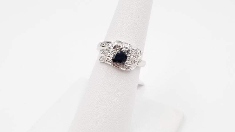 SAPPHIRE ( PEAR SHAPE ) WITH  BAGUETTE DIAMONDS 18 KT WHITE GOLD RING