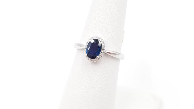 SAPPHIRES ( OVAL ) AND DIAMONDS 18 KT WHITE GOLD HALO RING