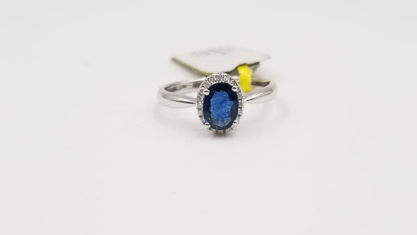 SAPPHIRES ( OVAL ) AND DIAMONDS 18 KT WHITE GOLD HALO RING