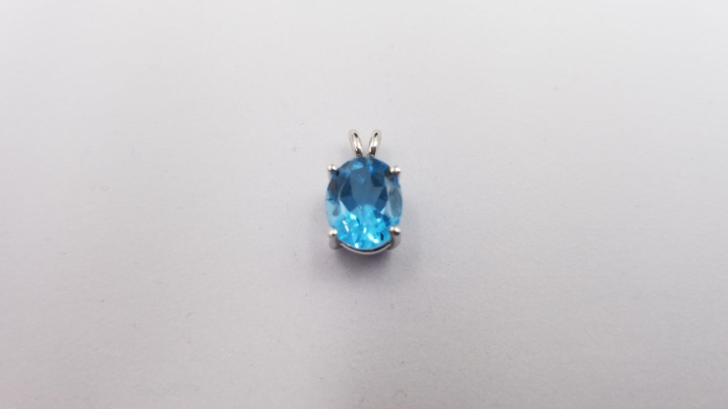 BLUE TOPAZ  (OVAL )8X10 MM  14 KT WHITE GOLD PENDANT