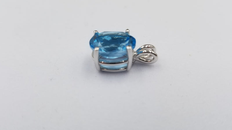 BLUE TOPAZ  (OVAL )8X10 MM  14 KT WHITE GOLD PENDANT