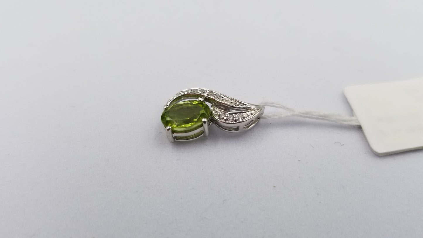 PERIDOT ( OVAL ) WITH DIAMONDS 14 KT WHITE GOLD PENDANT