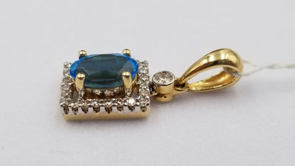 BLUE TOPAZ ( OVAL ) WITH DIAMONDS SQUARE SHAPE 14 KT YELLOW GOLD PENDANT