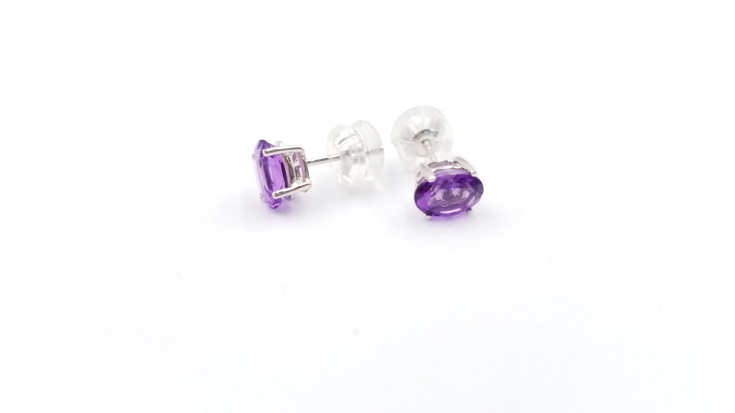 AMETHYST 5X7 MM OVAL 14 KT WHITE GOLD STUDS EARRINGS