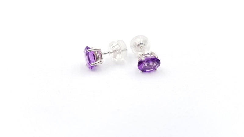 AMETHYST 5X7 MM OVAL 14 KT WHITE GOLD STUDS EARRINGS