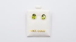 PERIDOT 6X8 MM OVAL 14 KT YELLOW GOLD STUDS EARRINGS