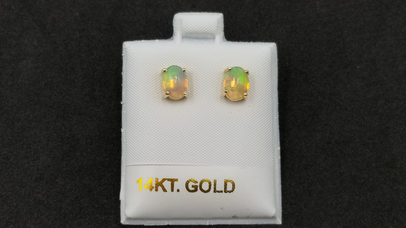 OPAL ( ETHOEPIAN )6X8 MM OVAL SHAPE 14 KT YELLOW GOLD STUD EARRINGS