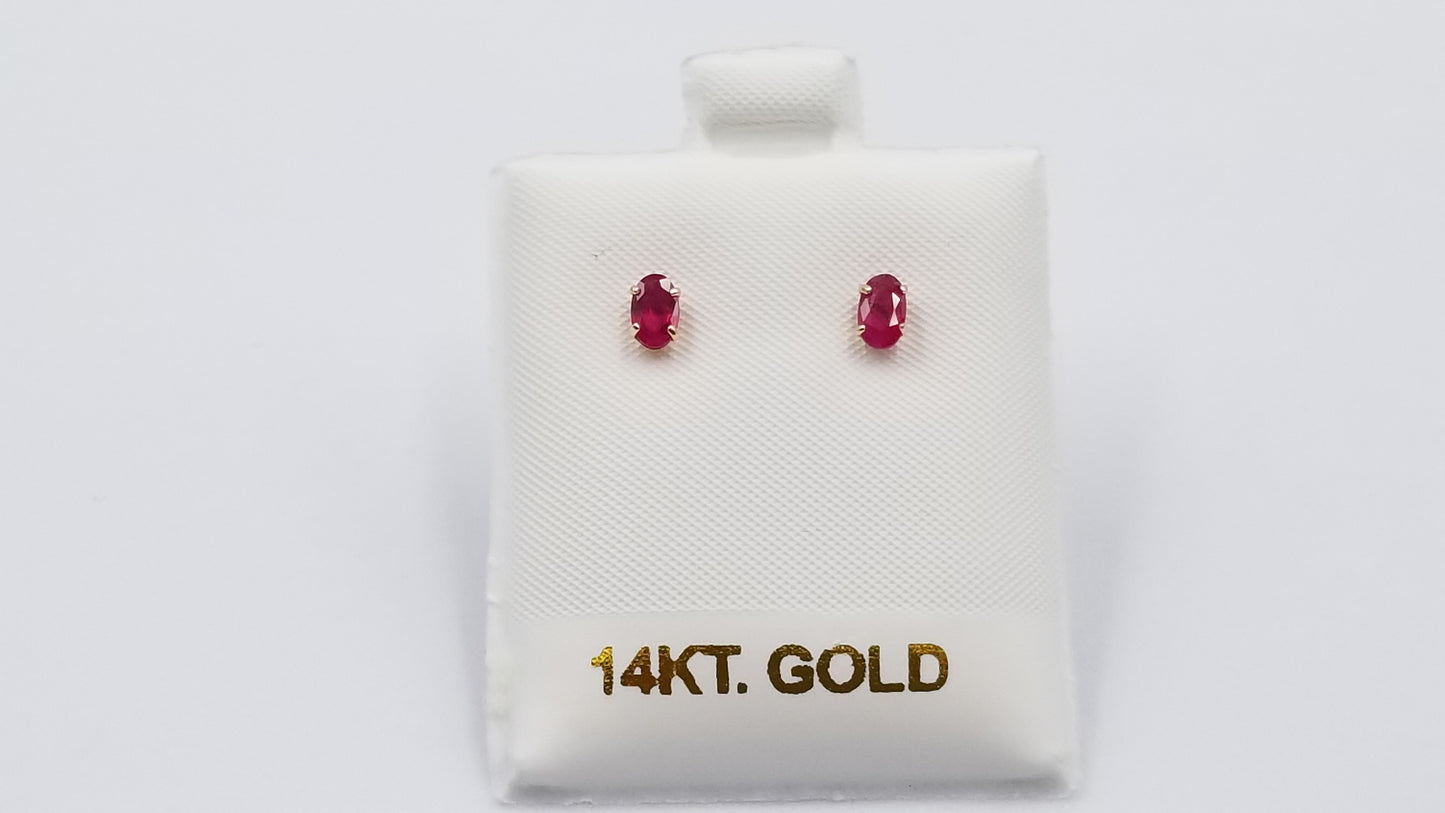 RUBY 3X5 MM OVAL 14 KT YELLOW GOLD STUD EARRINGS