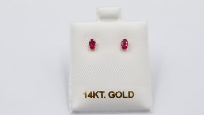 RUBY 3X5 MM OVAL 14 KT YELLOW GOLD STUD EARRINGS