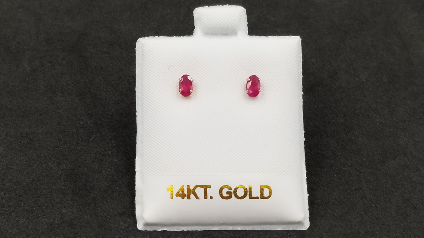 RUBY 3X5 MM OVAL 14 KT YELLOW GOLD STUD EARRINGS