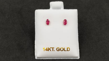 RUBY 3X5 MM OVAL 14 KT YELLOW GOLD STUD EARRINGS