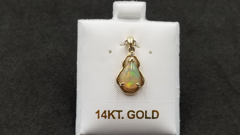 OPAL ( ETHEOPIAN ) PEAR SHAPE WITH DIAMOND 14 KT YELLOW GOLD PENDANT