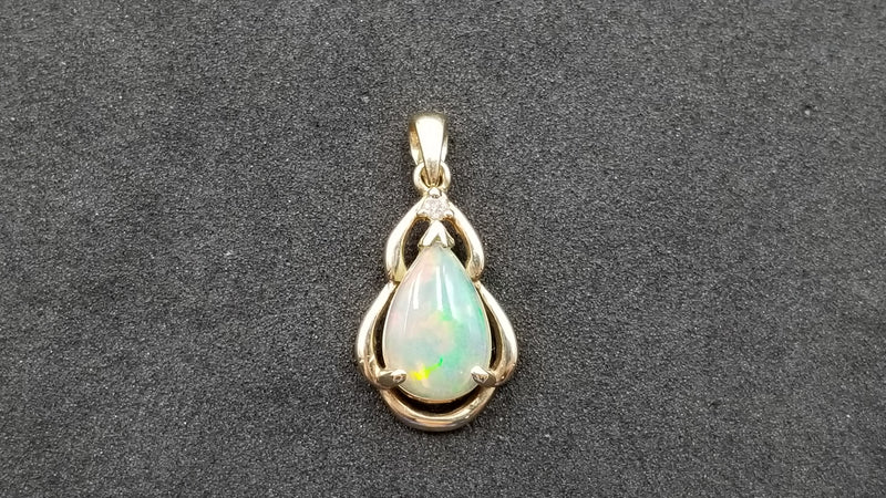 OPAL ( ETHEOPIAN ) PEAR SHAPE WITH DIAMOND 14 KT YELLOW GOLD PENDANT