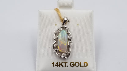OPAL ( AUSTRALIA ) FREEFORM CUT WITH DIAMONDS 18 KT WHITE GOLD PENDANT