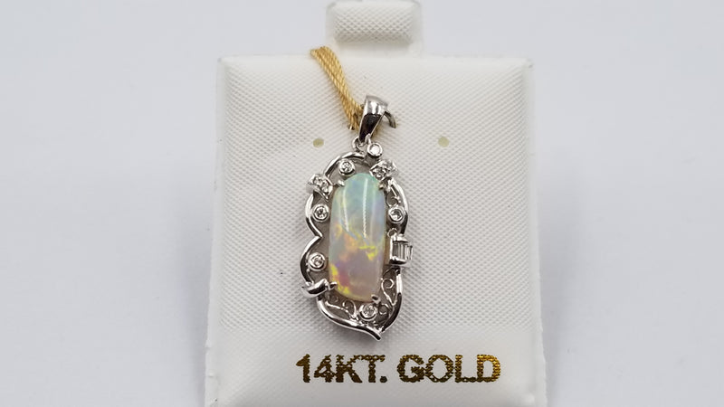 OPAL ( AUSTRALIA ) FREEFORM CUT WITH DIAMONDS 18 KT WHITE GOLD PENDANT