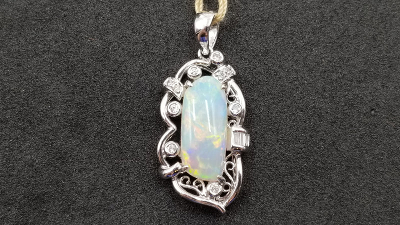 OPAL ( AUSTRALIA ) FREEFORM CUT WITH DIAMONDS 18 KT WHITE GOLD PENDANT