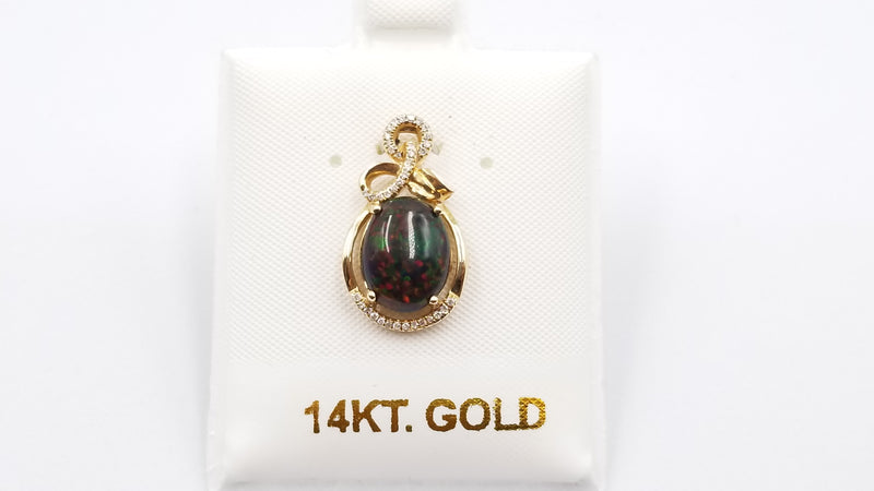 BLACK OPAL ( ETHEOPIAN ) OVAL 8X10 MM WITH DIAMONDS 14 KT YELLOW GOLD PENDANT