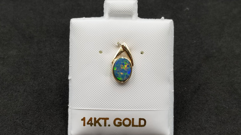 BOULDER OPAL DOUBLET BEZEL SET 14 KT YELLOW GOLD PENDANT