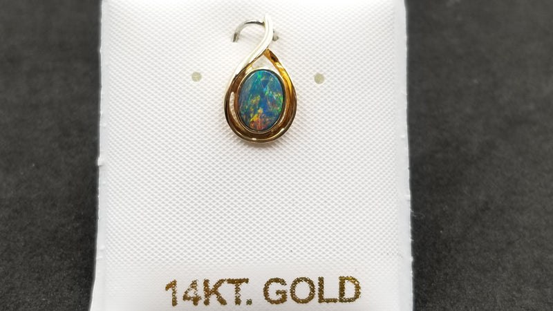 BOULDER OPAL DOUBLET BEZEL SET 14 KT YELLOW GOLD PENDANT