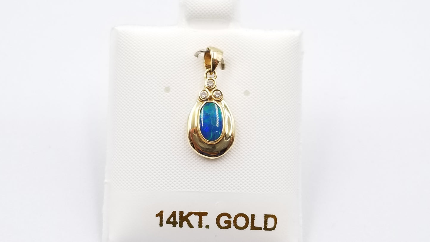 BOULDER OPAL DOUBLET BEZEL SET WITH DIAMONDS 14 KT YELLOW GOLD PENDANT