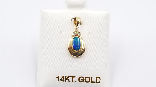 BOULDER OPAL DOUBLET BEZEL SET WITH DIAMONDS 14 KT YELLOW GOLD PENDANT