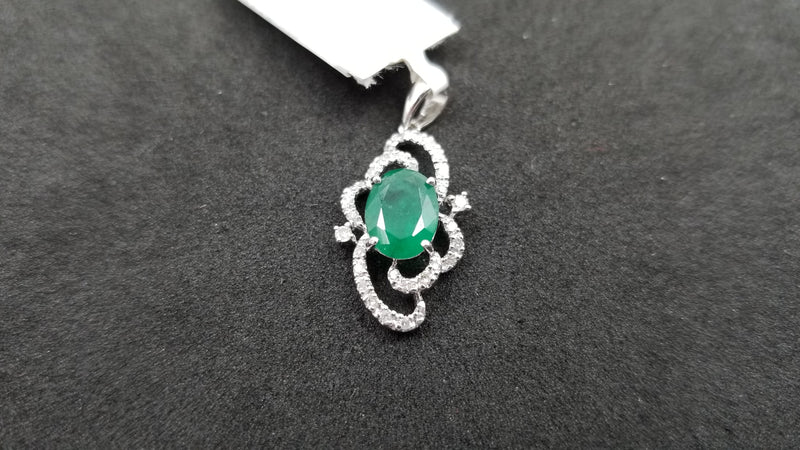 EMERALD WITH DIAMONDS 14 KT WHITE GOLD PENDANT